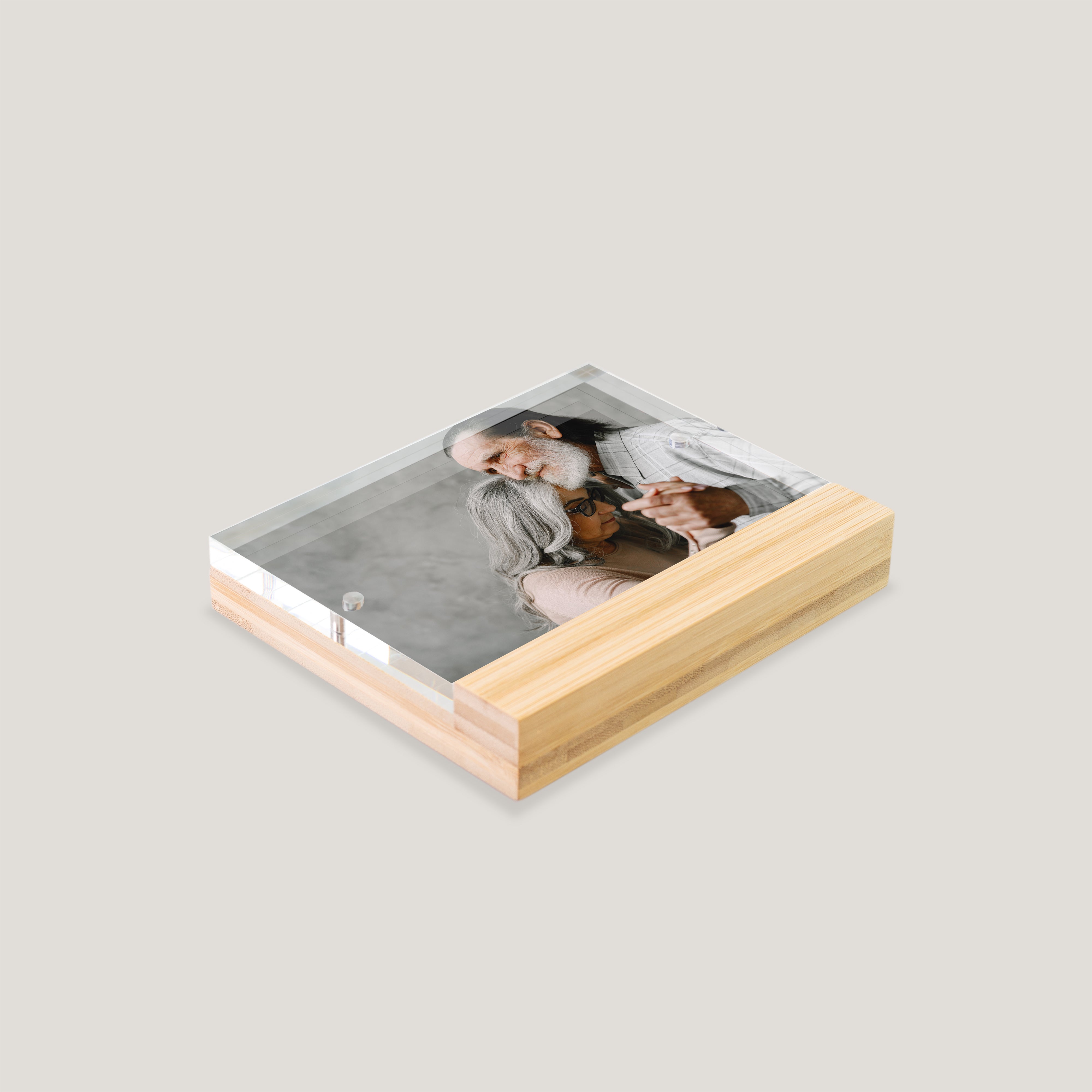 Side view of Peleman 4x6 Bamboo Acrylic Frame showing magnetic closure and premium bamboo base.