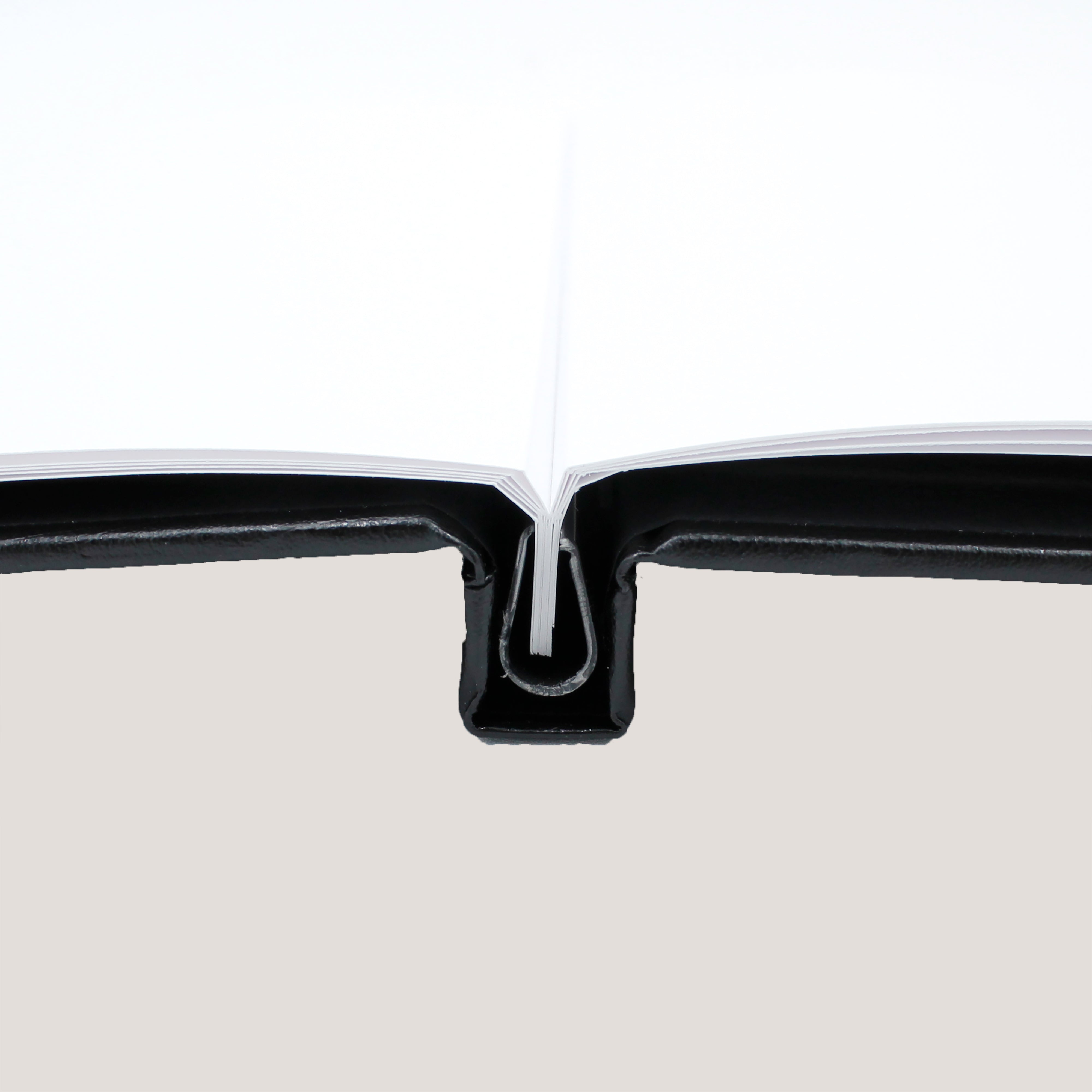 Side view of Astrale Black Clamp Binding Photobook showing durable black hardcover design.