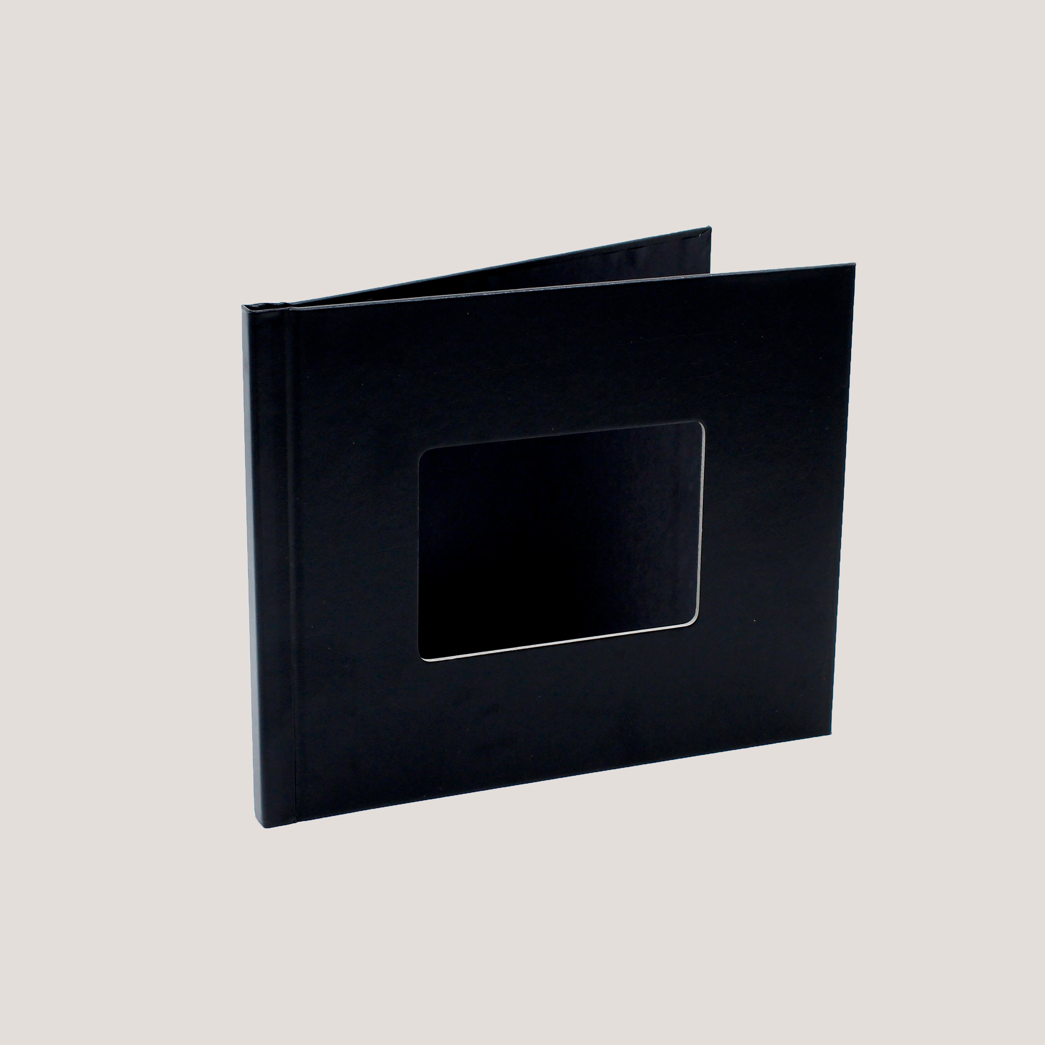 Side view of Astrale Black Clamp Binding Photobook showing durable black hardcover design