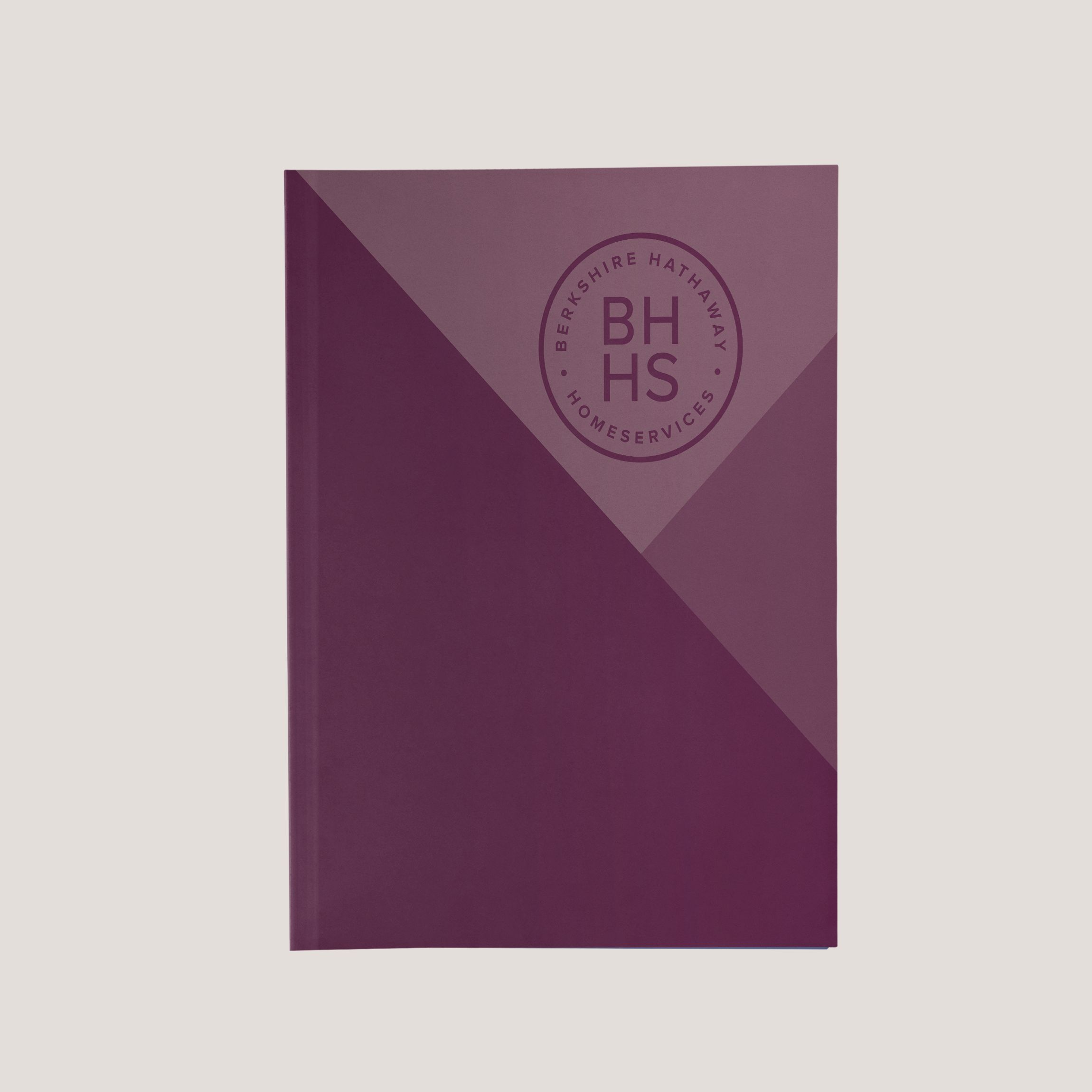 Close up of BHHS Cabernet Lay Flat Pocket Folder featuring raised UV Scodix logo branding