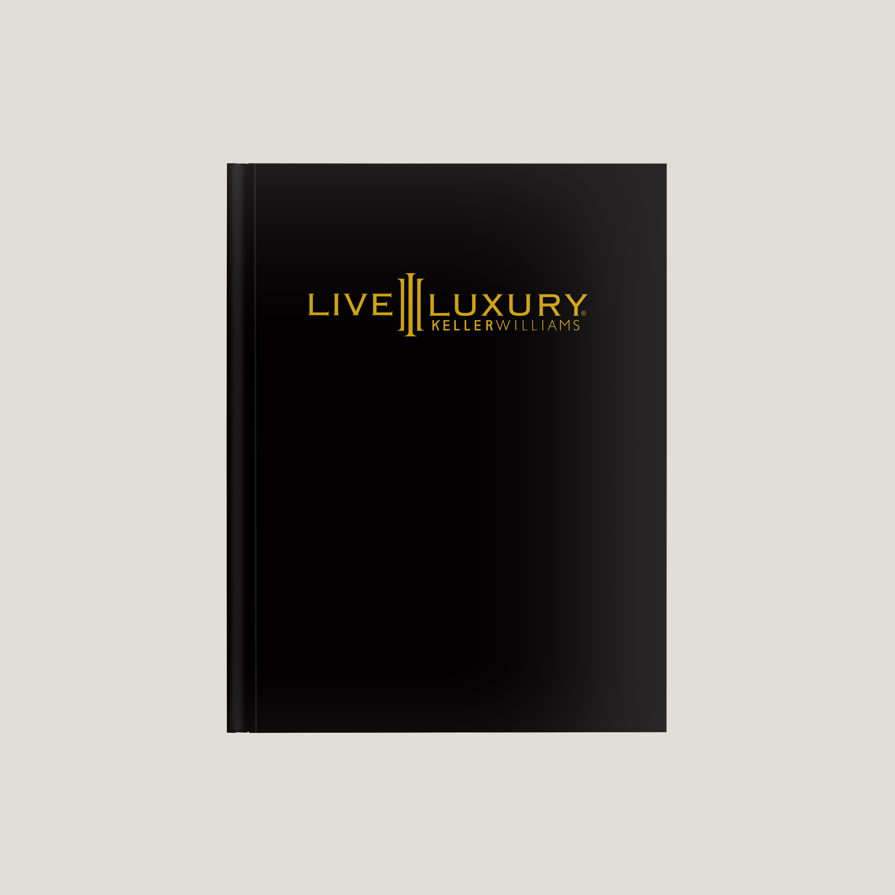 Black book with 'Live Luxury Keller Williams' logo on a light gray background