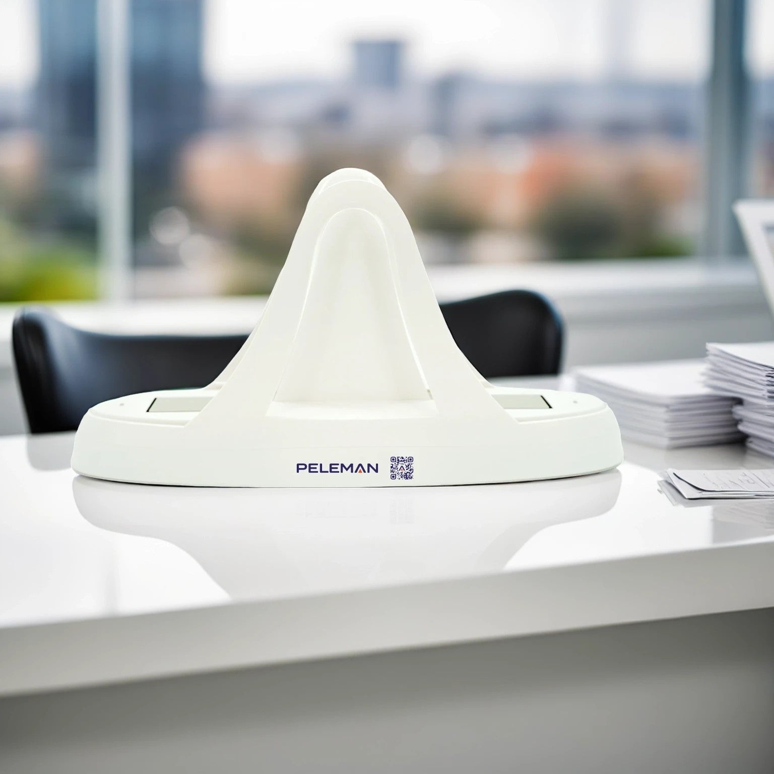 Peleman Unibind 60 Thermal Binding Machine placed on office desk – space saving solution for low traffic document binding