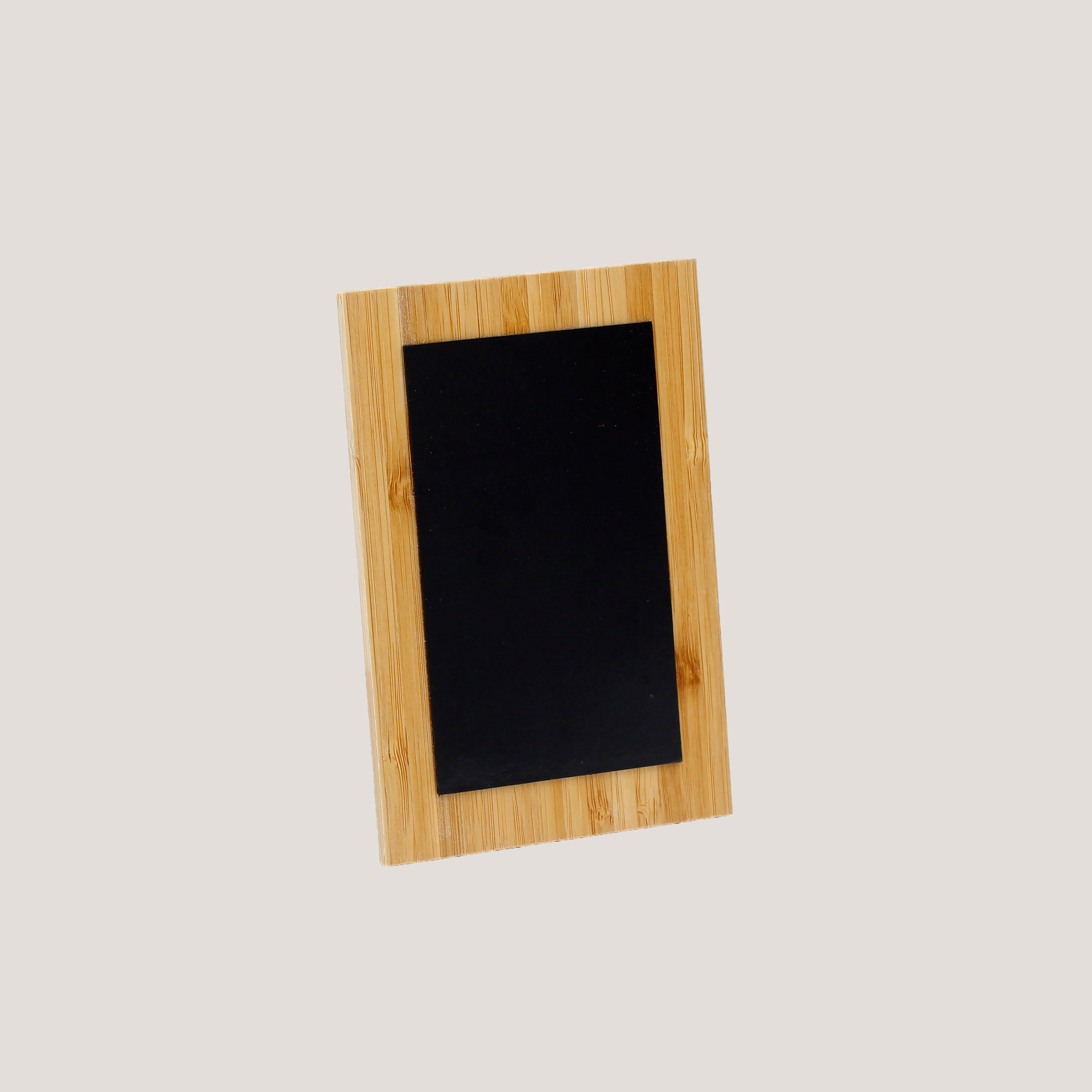 Side angle of Peleman Bamboo Photo Magnet showing slim bamboo backing and smooth photo surface