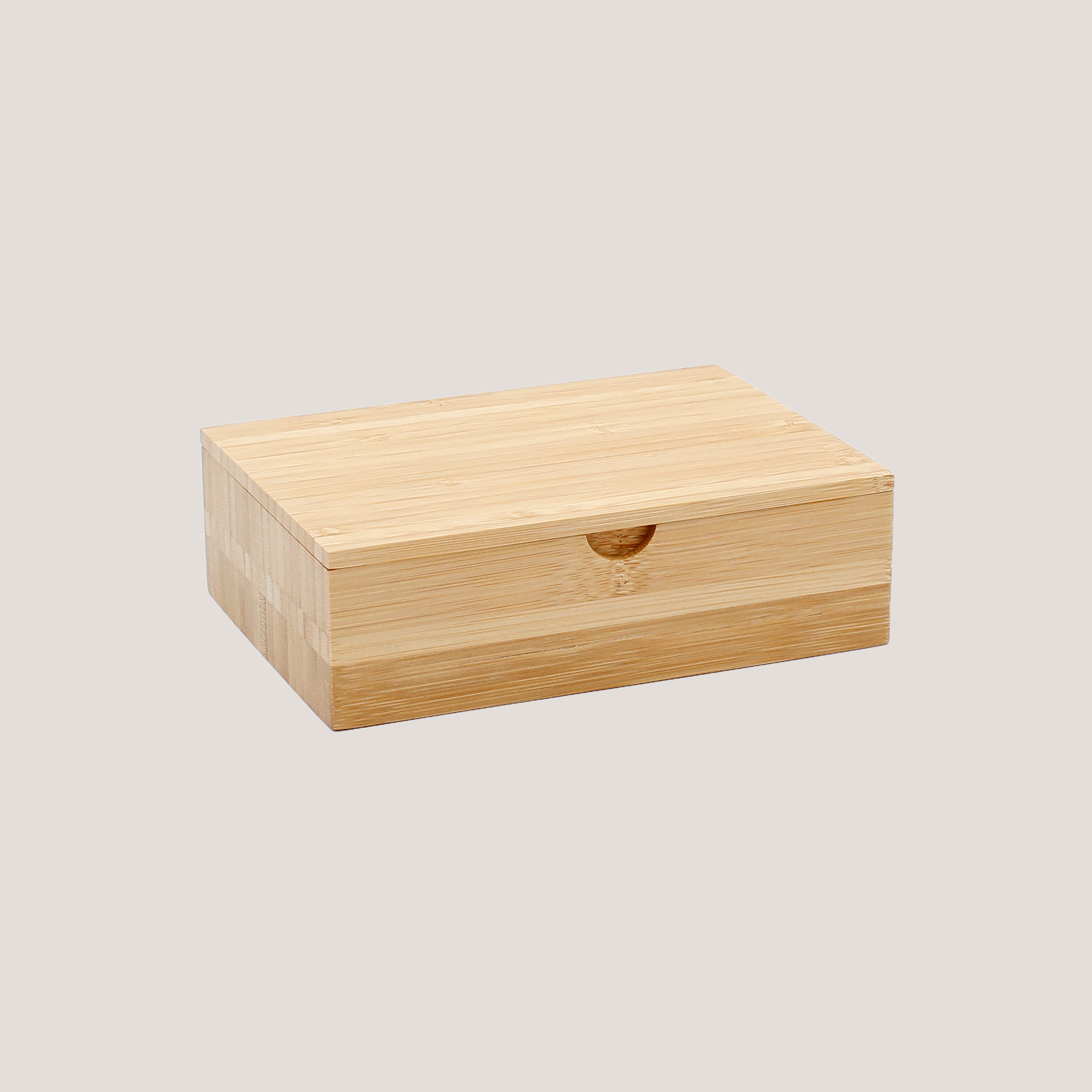 Side angle of Peleman Bamboo Memory Box showing smooth bamboo texture and sturdy design