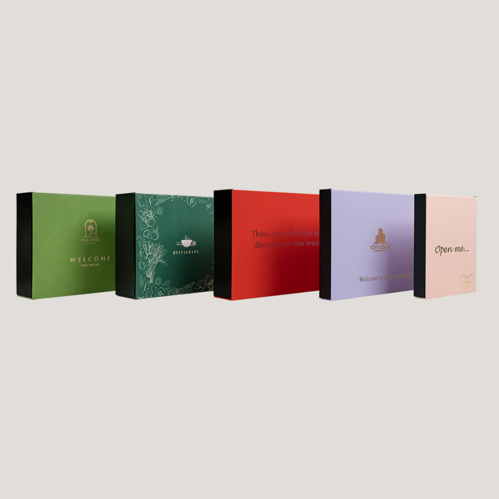 Multiple custom presentation boxes in green, teal, red, lavender, and pink, each featuring unique business branding