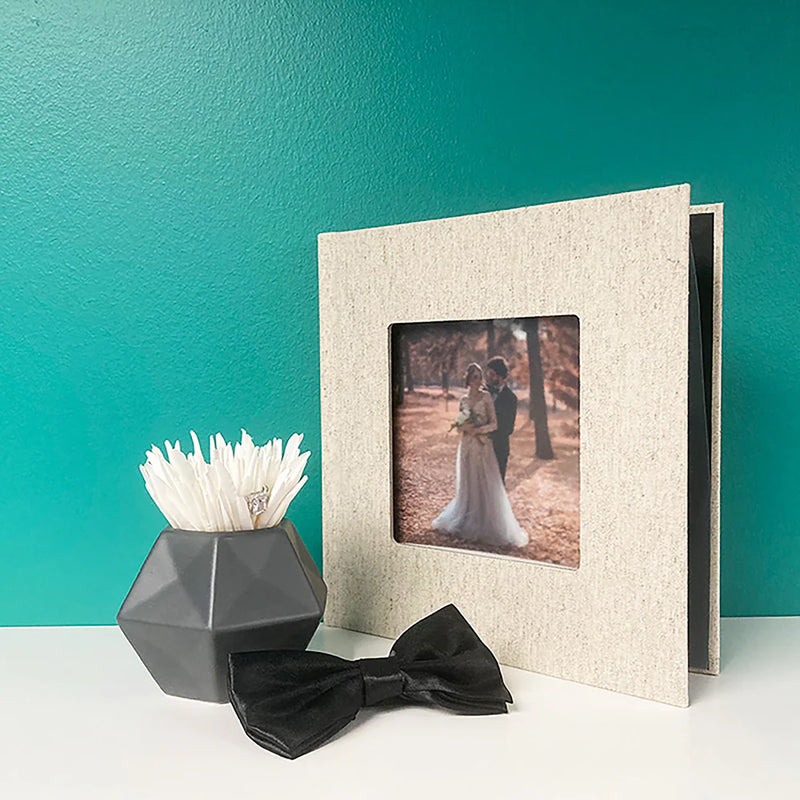 Peleman 9x9 linen photobook — premium fabric-covered photo album