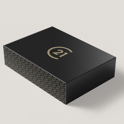 A black gift box with a gold pattern and the number 21 written on it, indicating a luxury weight and sturdy construction with magnetic closure.