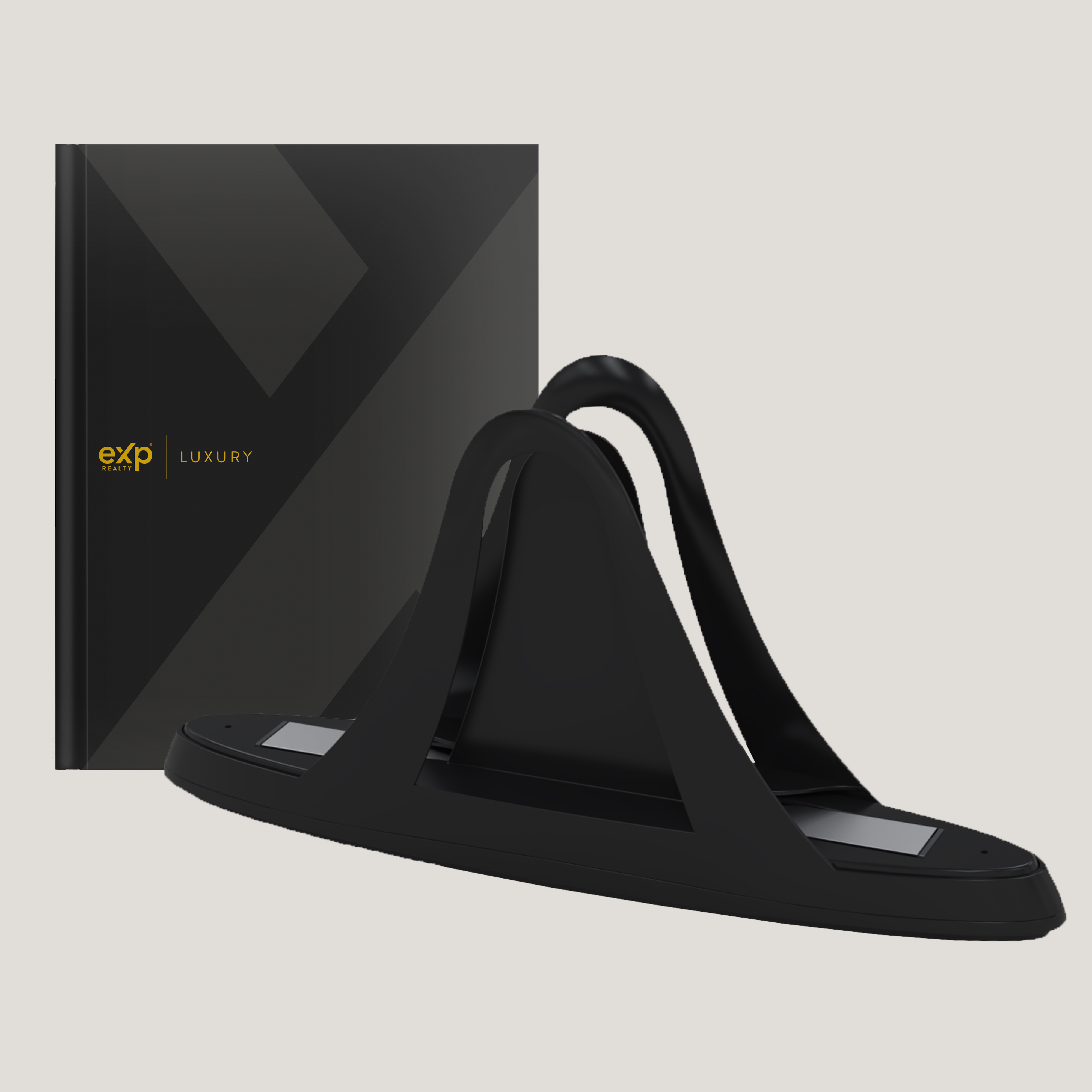Black sandal and box with 'exp LUXURY' branding on a light gray background