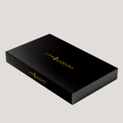 Black box with 'Live Luxury' branding on a light gray background