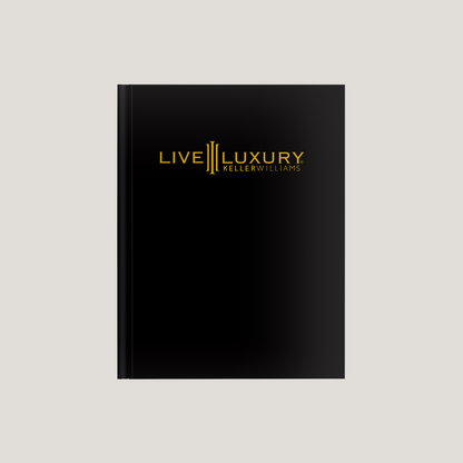 Black book with 'Live Luxury Keller Williams' logo on a light gray background