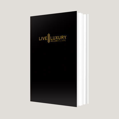 Black book with 'Live Luxury Keller Williams' logo on a light gray background