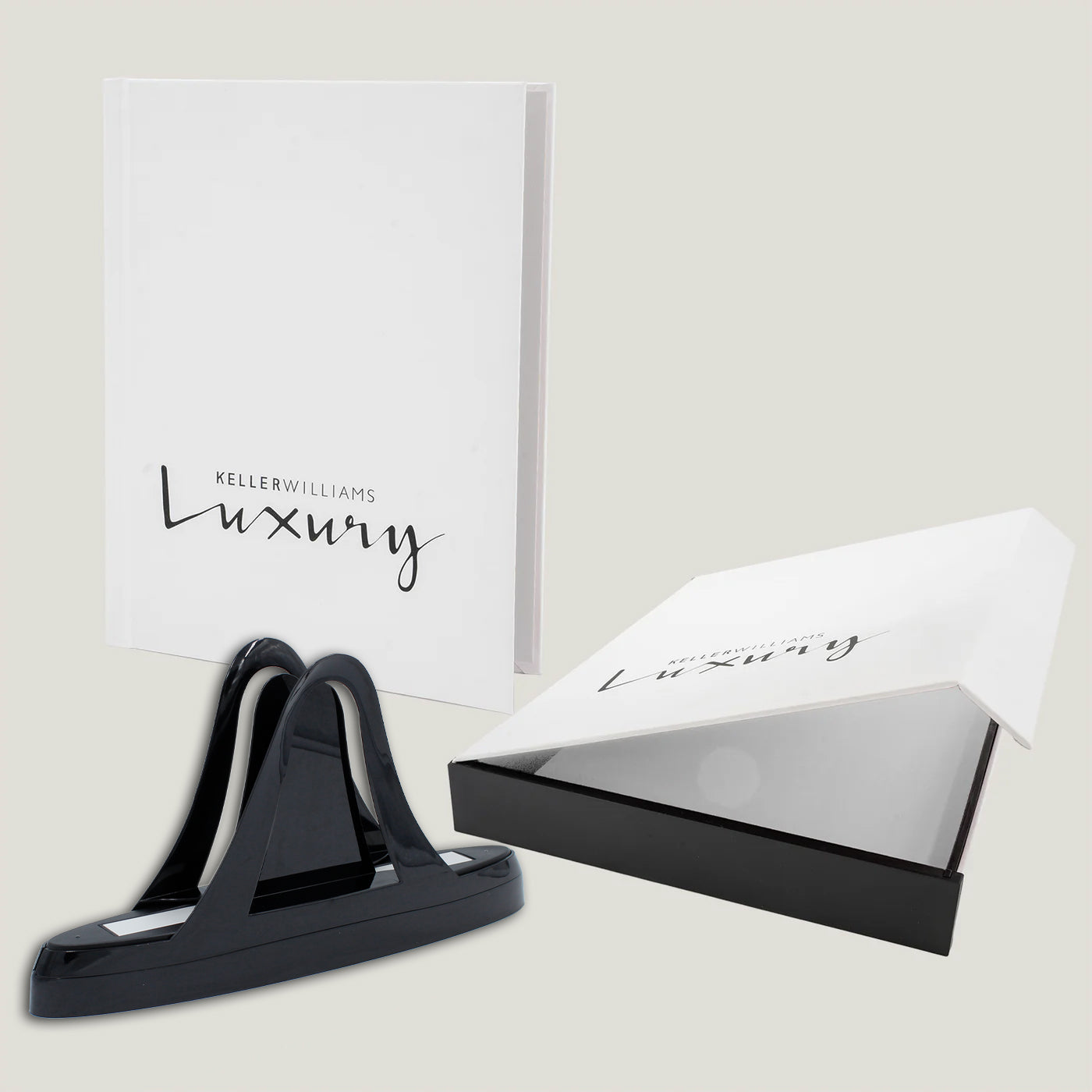 Peleman thermal binding machine with Keller Williams Luxury hardcover book